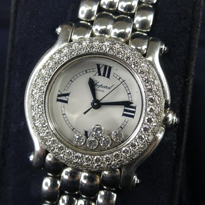 Lot 2611 - A lady's stainless steel Chopard Happy Sport...