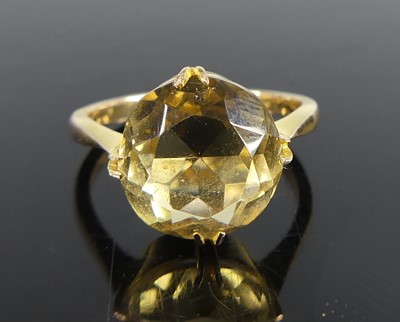 Lot 2660 - A yellow metal and citrine set ring, featuring...