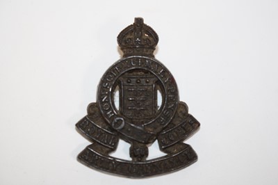 Lot 254 - A Royal Army Ordnance Corps economy cap badge,...