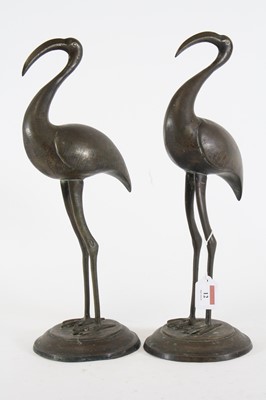 Lot 12 - A pair of bronzed metal figures of flamingoes,...