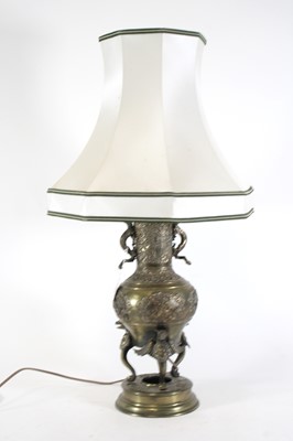 Lot 23 - A Japanese brass vase, with applied dragon...