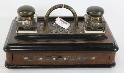 Lot 24 - A Victorian walnut and parcel ebonised desk...