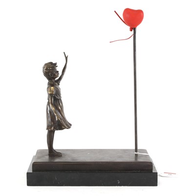 Lot 38 - A contemporary bronzed metal figure, after...