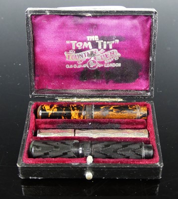 Lot 40 - A Roman style glass bottle vase, together with...