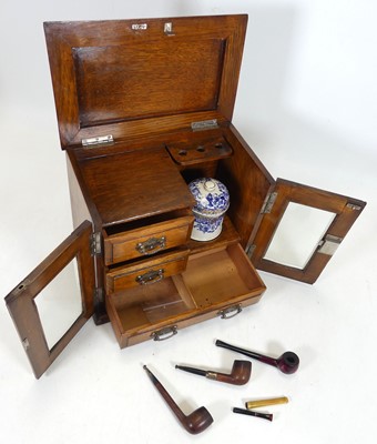 Lot 95 - A Victorian oak smoker's cabinet, having a...