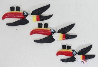 Lot 102 - A graduated set of three cast metal Guinness...