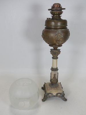 Lot 109 - A 19th century French oil lamp, having an...
