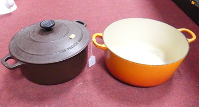 Lot 130A - A Le Creuset orange enamelled cast iron...