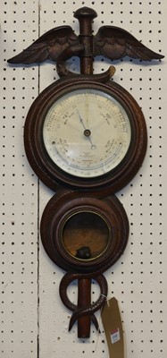 Lot 1141 - An early 20th century relief carved oak...