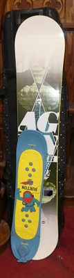 Lot 1129 - A snowboard bag containing a snowboard, helmet,...