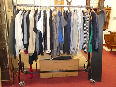 Lot 1150 - A rail of various designer clothing, to...