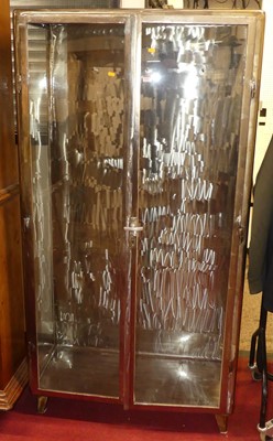 Lot 1151 - A contemporary burnished steel double door...