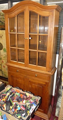 Lot 1152 - A provincial walnut freestanding corner...