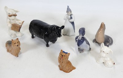Lot 173 - A collection of figures of animals, to include...