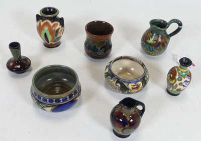 Lot 180 - A group of eight Gouda miniature ceramics, to...