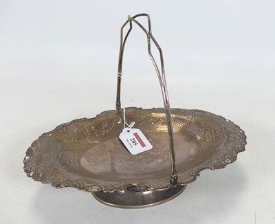 Lot 205 - A Chinese white metal swing handled basket,...
