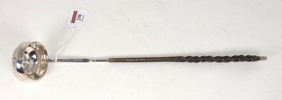 Lot 298 - A 19th century continental silver toddy ladle,...