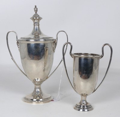 Lot 312 - A George V silver trophy cup, the removable...