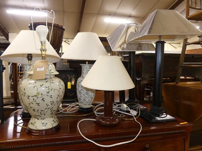 Lot 1167 - *A pair of floral glazed stoneware table lamps...