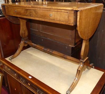 Lot 1170 - A figured walnut and crossbanded drop-flap...