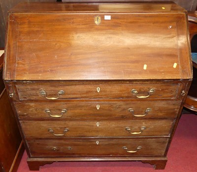 Lot 1172 - An early 19th century mahogany slope front...