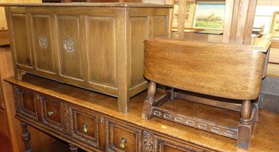 Lot 1182 - An oak four panelled hinged top blanket chest,...