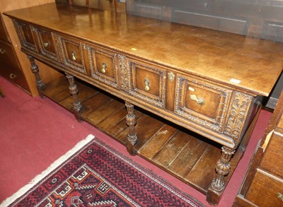 Lot 1183 - A Jacobean style joined oak three-drawer long...