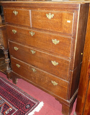 Lot 1185 - A circa 1800 provincial oak chest of two short...