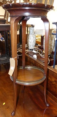 Lot 1192 - An Edwardian mahogany piecrust topped two-tier...