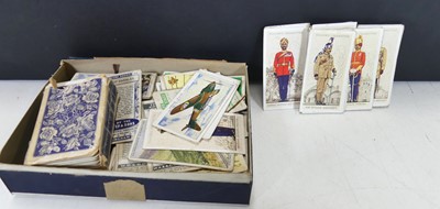 Lot 464 - A collection of cigarette cards, to include...