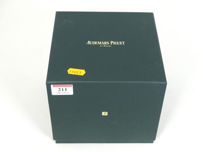 Lot 211 - A watch box, the green wood effect case marked...