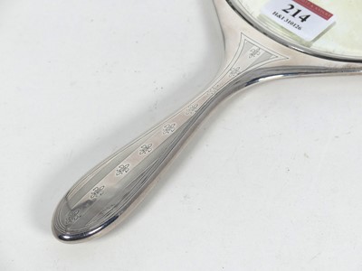 Lot 214 - An early 20th century silver-backed hand...