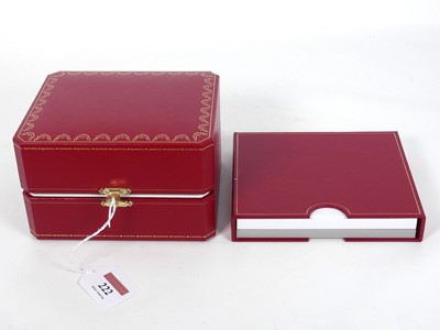 Lot 222 - A Cartier gilt-tooled red leather watch case,...