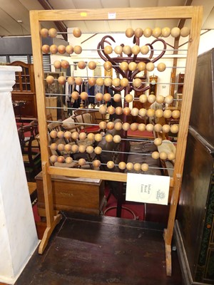 Lot 1203 - *A pine and beech freestanding Indian Bead...