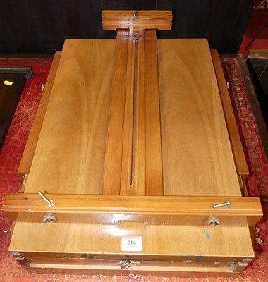 Lot 1216 - A travelling fold-down box artist easel