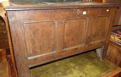 Lot 1228 - An 18th century joined oak three-panelled...
