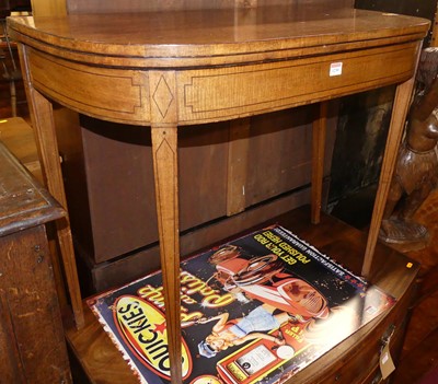 Lot 1230 - A Regency mahogany D-shape fold-over tea table,...