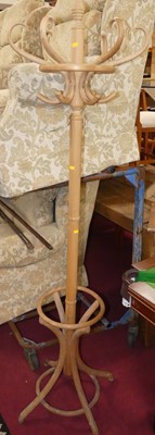 Lot 1239 - A pale bentwood freestanding combination...