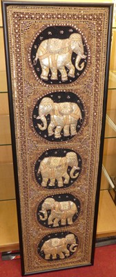 Lot 1111 - An Indian gold thread worked panel depicting a...