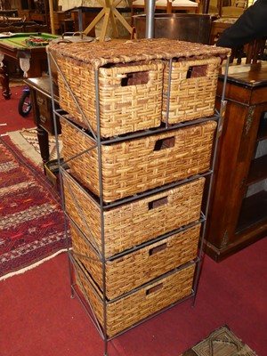 Lot 1262 - A wired metal and rush freestanding compact...