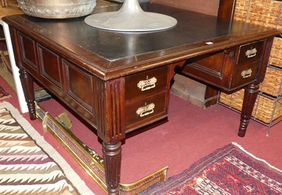Lot 1267 - A hardwood square kneehole partner's desk,...