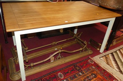 Lot 1272 - A contemporary dining table, raised on painted...