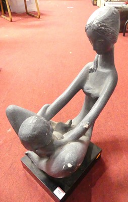 Lot 512 - A painted composite figure group of a mother...