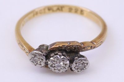 Lot 357 - An 18ct gold and platinum diamond three-stone...
