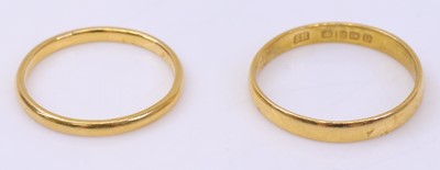 Lot 362 - A 22ct gold court shaped wedding band, sponsor...