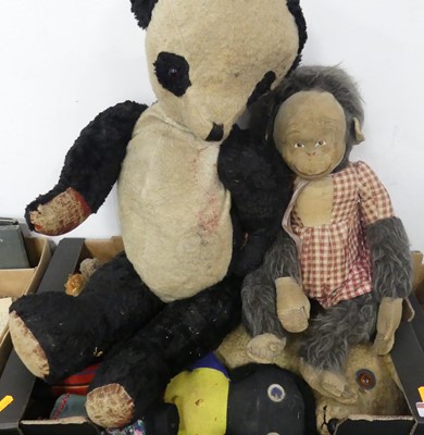 Lot 519 - A collection of teddies, to include a panda...