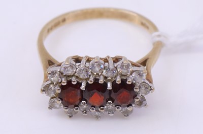 Lot 364 - An Edwardian style 9ct gold garnet and cz set...