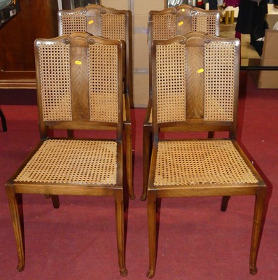 Lot 1275 - A set of four 1920s walnut cane back and seat...