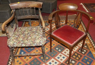 Lot 1279 - A 19th century mahogany barback scroll elbow...