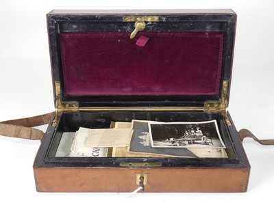Lot 231 - A brown leather clad box with black leather...